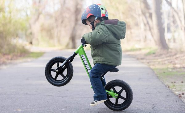 Strider - 12 Sport Kids Balance Bike�� No Pedal Training Bicycle�� Lightweight Frame�� Flat-Free Tires�� For Toddlers and Children Ages 18 Months to 5 Years Old (Green) - Image 2